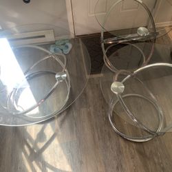 2 glass side tables one center piece 