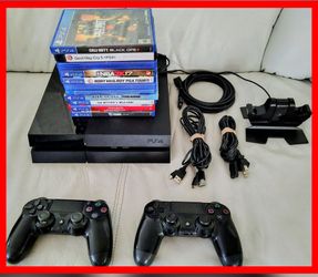 PlayStation 4 PS4 ,11 games and 2 controllers, 2 charging cords and charging cradle , power cable for console and HDMI cable