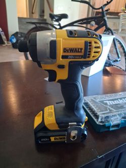 Dealt and ryobi impact with battery, drill bits, dealt car charger, a anker charger, rolling tape measure