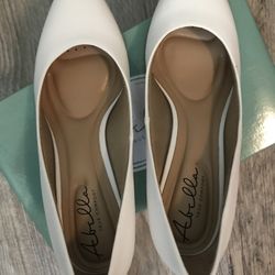 Abella White Pumps