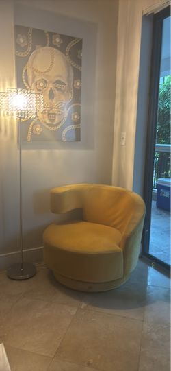 Mustard yellow swivel chair