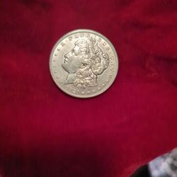 1921 Morgan Silver Dollar in AU