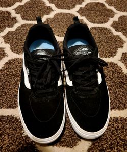 Vans Kyle Walker Pro sneakers feature a black suede upper and the signature white side stripe.