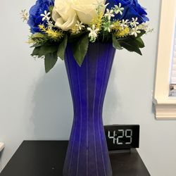 Blue Vase And Flowers