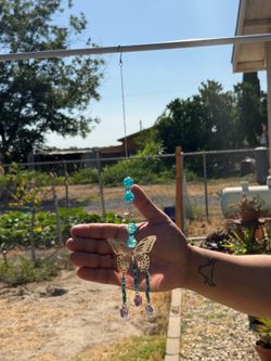 Blue butterfly sun catcher