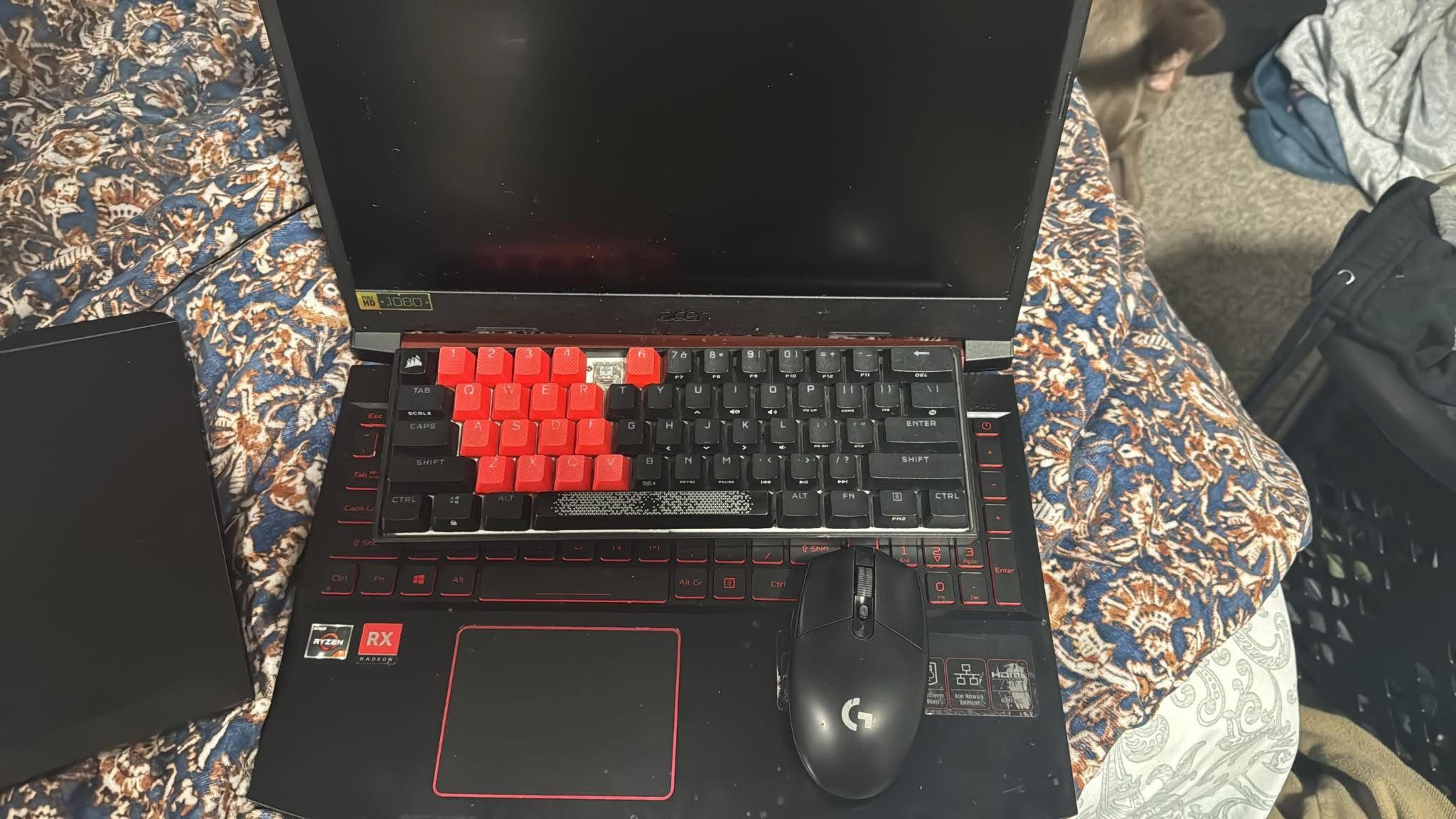 Gaming laptop with keyboard and mouse