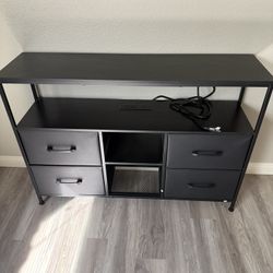 TV Stand with plugs attached 