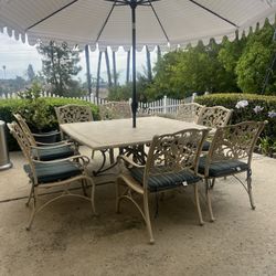 FREE  Costco dining table/chairs (not umbrella)