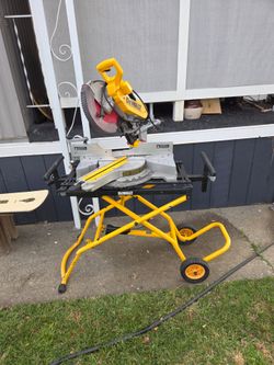 12"  DeWalt sliding compound miter saw  with  collapsible rolling  stand