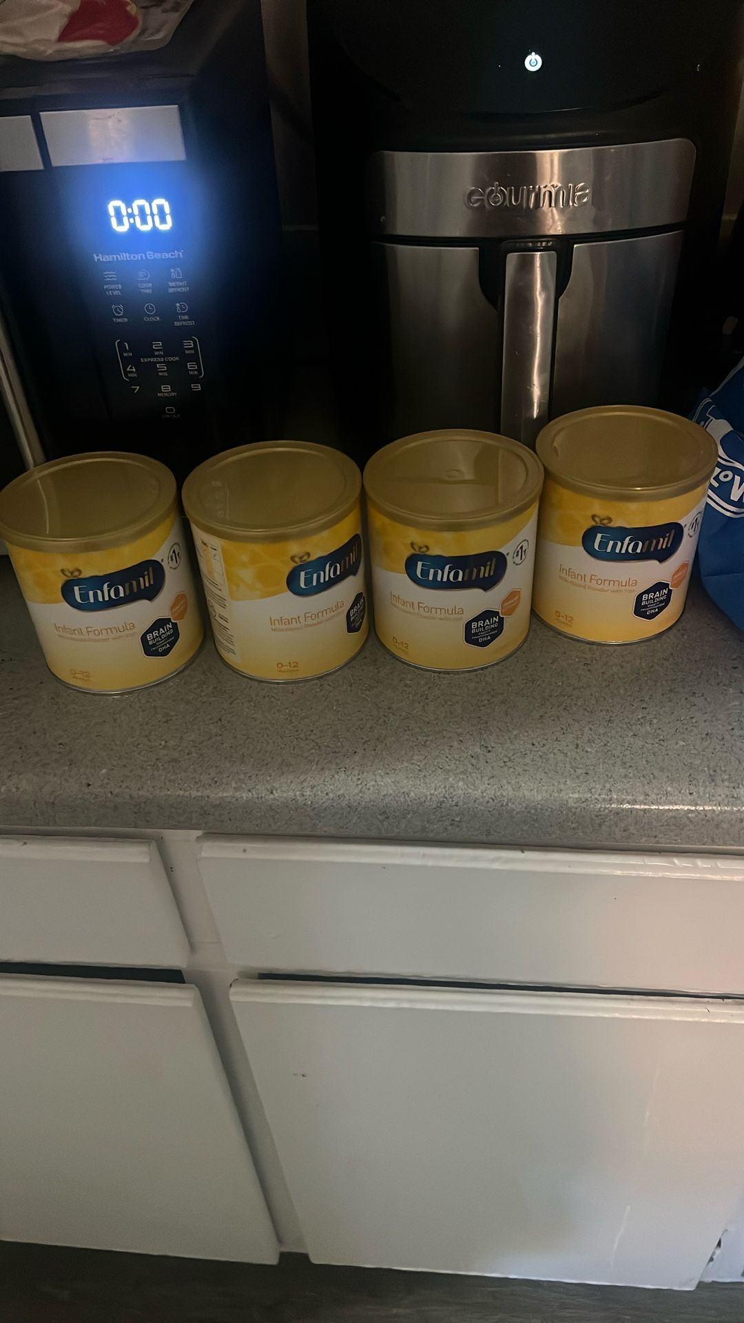 4 Yellow Cans Of Enfamil