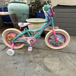 PAW Patrol "Girl Pup Power" 12-Inch Bike (featuring the characters Skye and Everest).