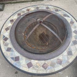 Backyard Fire Pit With Grate And Domed Mesh Screen And Mosaic Tiles 