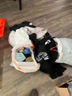 Lot of clothes. Bags of good clothes