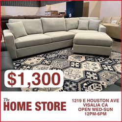 Gray Fabric Sectional With Ottman (Free Area Rug With Purchase)