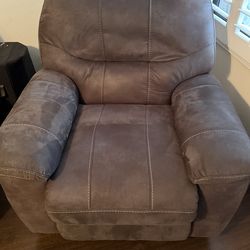 Rocking leather chair that reclines f