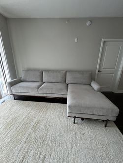 Two piece sofa with chaise - light grey / beige like new