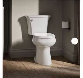 Highline Arc 10 in. Rough In 2-Piece 1.28 GFP Single Flush Round Chair Height Toilet in White with Soft Close Seat