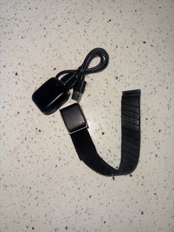Whoop  - Black Fitness Tracker with Charging Cable