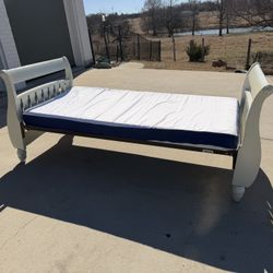 Twin Sleigh Bed + Mattress + Cover - $150