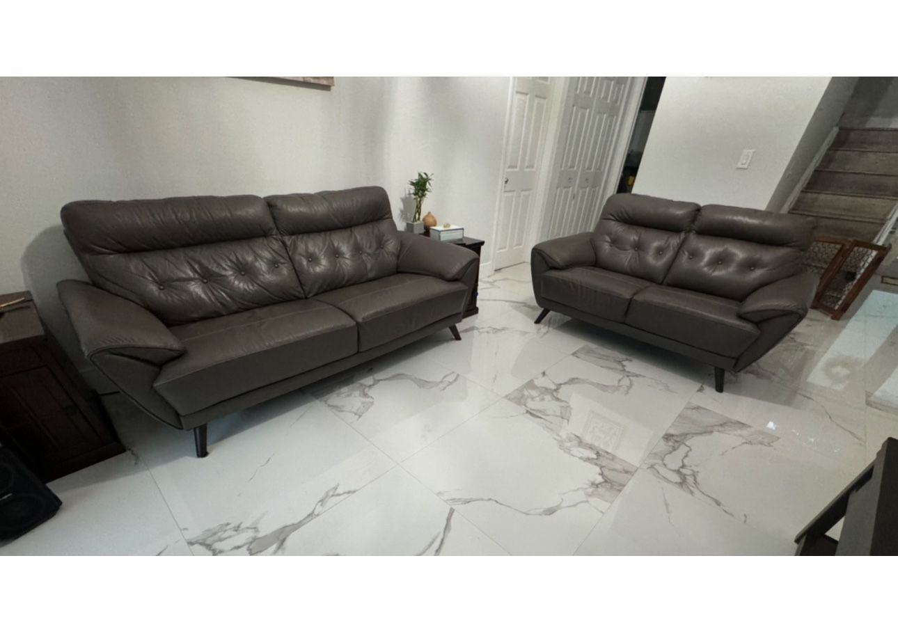 Ashley Furniture - Gray Leather Modern Sofa and Love Seat Set