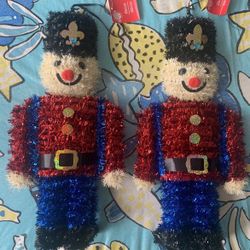 2pk Christmas Themed Tinsel Nutcracker Hanging Wall Decor, 15x6.75 in.