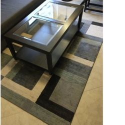 Coffee table with rollable wheels 