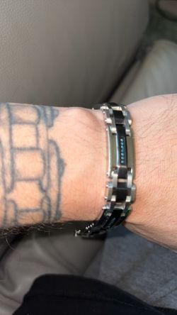 Men’s black and silver bracelet with blue diamonds