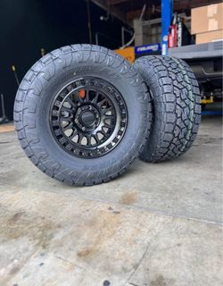 KMC KM552 IMS Matte Black W/Gloss Black Lip 33x12.50R17 Toyo Open Country ATIII Tires Package Deal