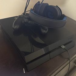 Playstation 4 with charger and controller
