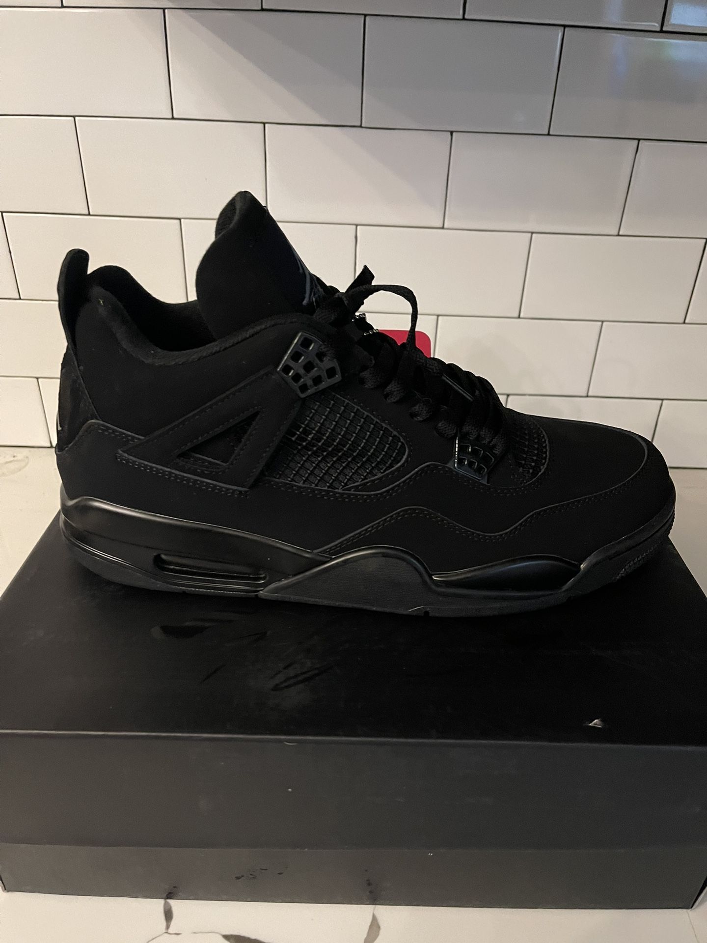 Men’s Jordan Retro 4 Black Cat Size 14.