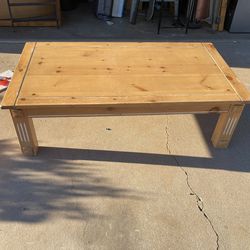 Wood coffee table with accents