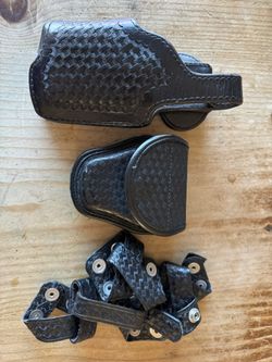 Belt Keeper Holster And Handcuffed 