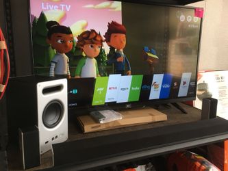 49” LG 4K UHD SMART TV with VIZIO 5.1 home theatre
