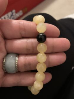 Yellow Jade with centered Black Tourmaline