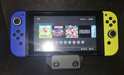 Nintendo SWITCH with Games and Controllers