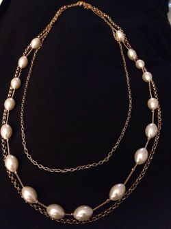 Gold tone and pearl necklace and earring set