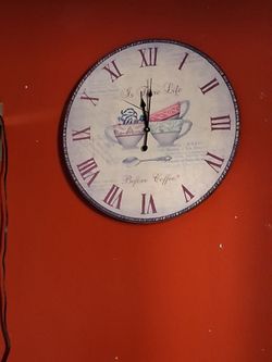 vintage-style round wall clock with numeral numbers