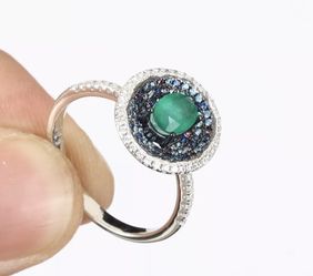 Size 7.75 emerald and topaz .925 silver ring
