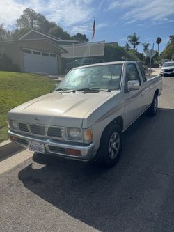 Solid 2nd owner Nissan low miles