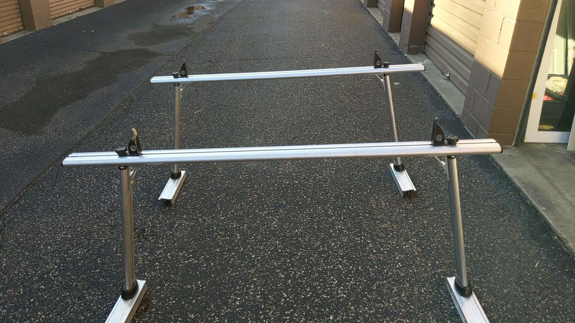 Adjustable ladder racks