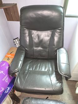 Leather chair with foot rest