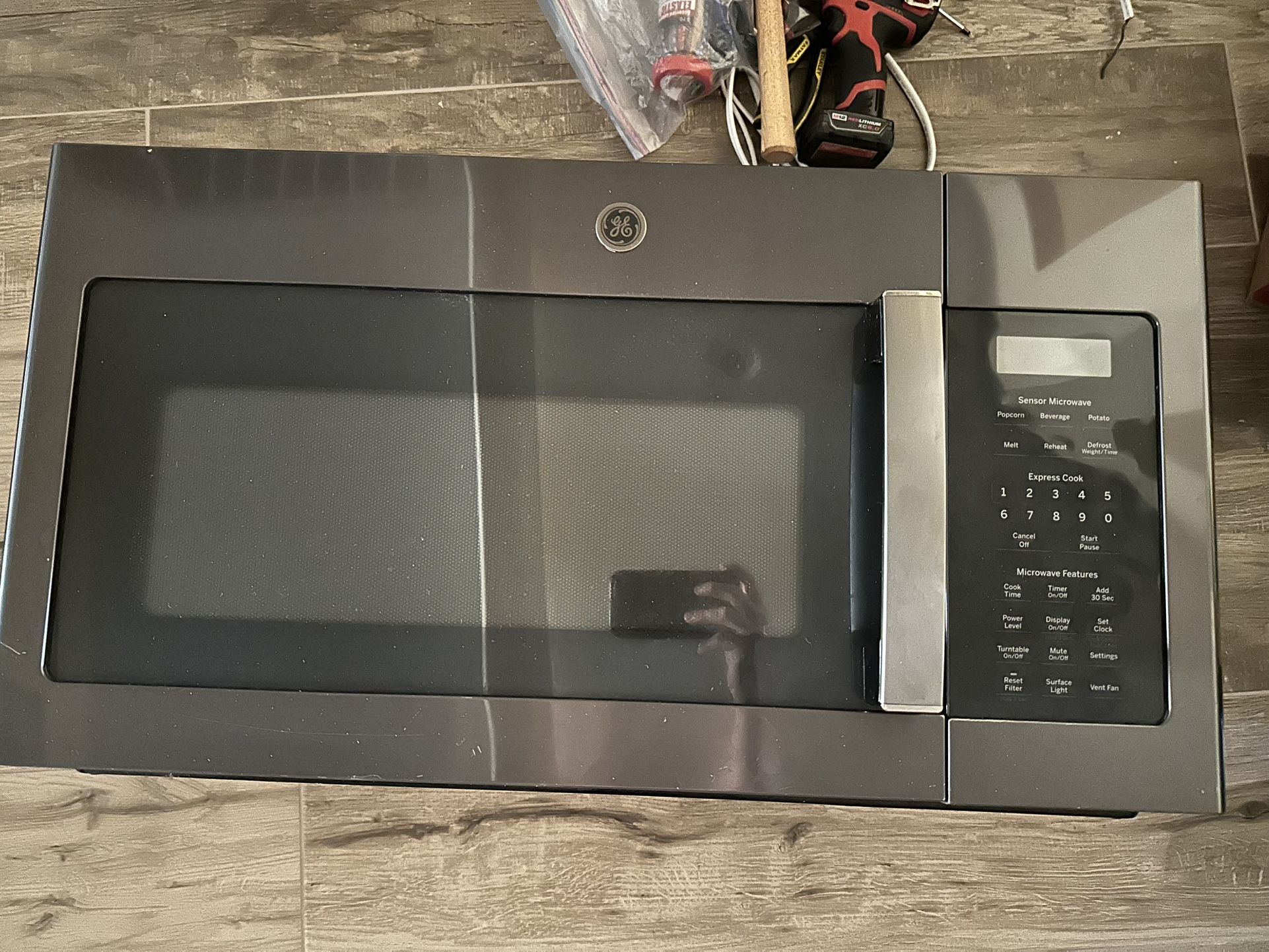 GE Over The Stove Microwave. Good Condition