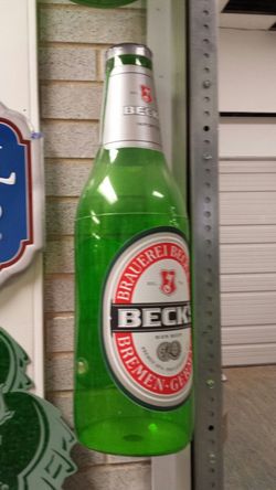 Beck's inflatable bottles approximately 18 inches tall