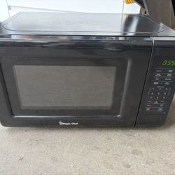 Magic Chef 0.9 Cubic Feet 900 Watt Stainless Countertop Microwave Oven for Compact Spaces with 6 Pre Programmed Cooking Modes, Black