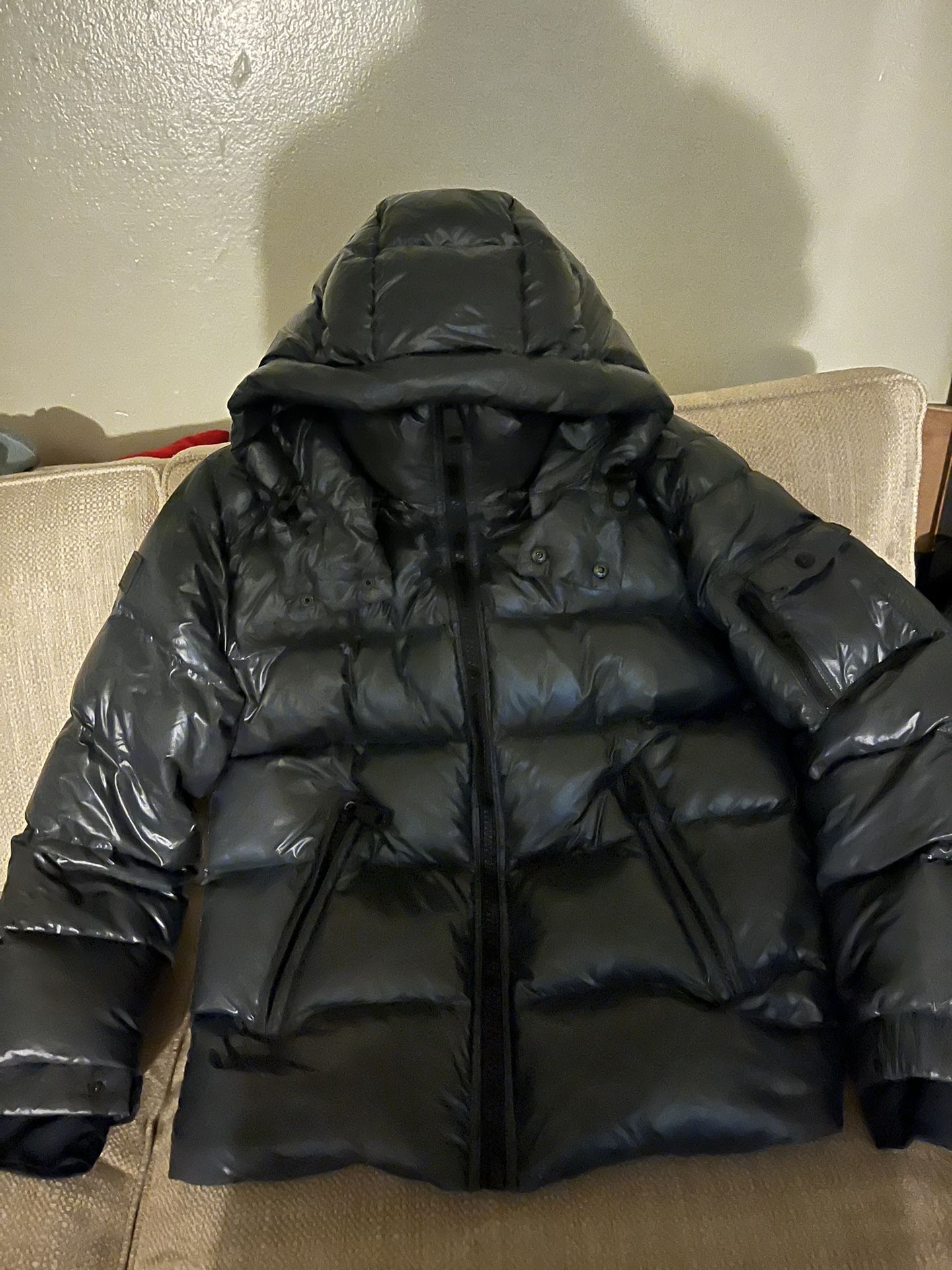 Sam’s New York puffer Cost