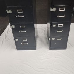 Two- Double Locking Four Drawer Filing Cabinets 