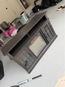 Entertainment center with heater