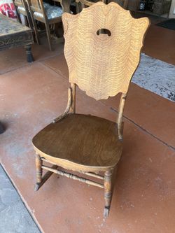 Antique curly maple rocking chair