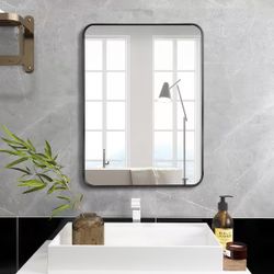 24 in. W x 32 in. H Black Rectangle Framed Mirror