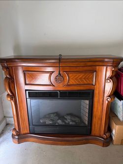 Electric Fireplace with Wood Mantel
